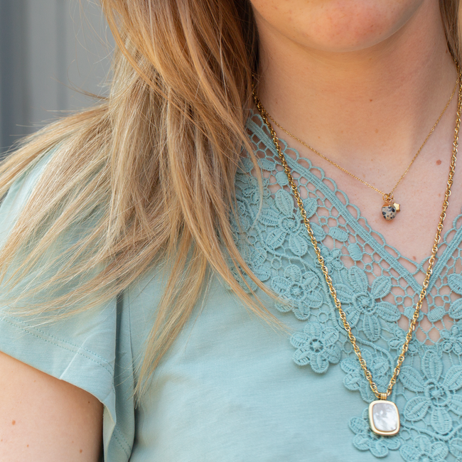 Bohm Paris Goud schakelketting met rechthoek parelmoerbedel of parelmoer ring