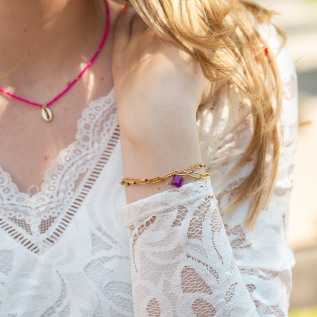 Goud dubbele armband met paarse klaver