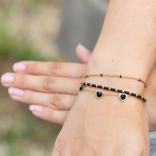 Day & Eve  Zwarte kralen en harten armband