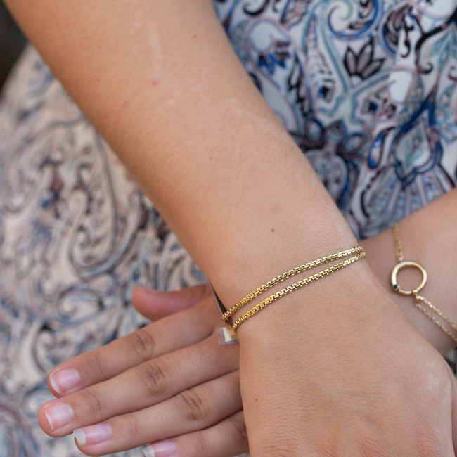 Dubbele schakel armband goud