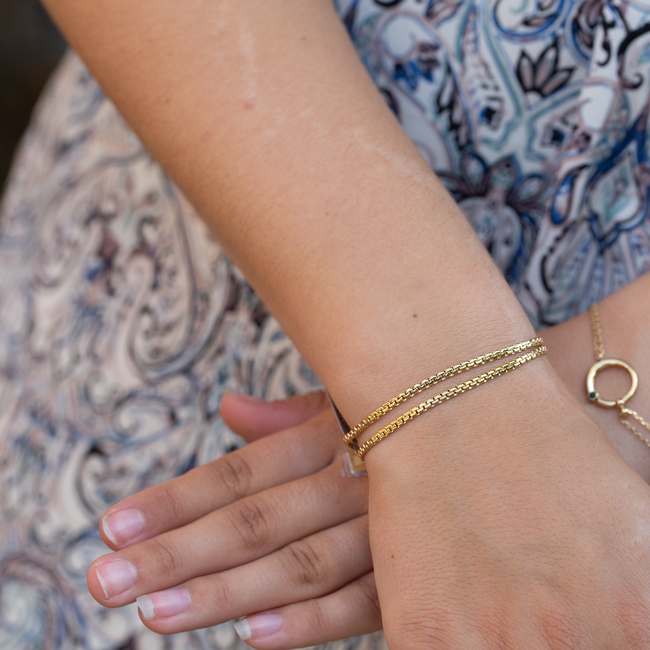 Dubbele schakel armband goud