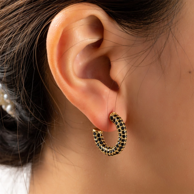 Day & Eve  Goud ronde oorbellen met zwarte crystal glitters