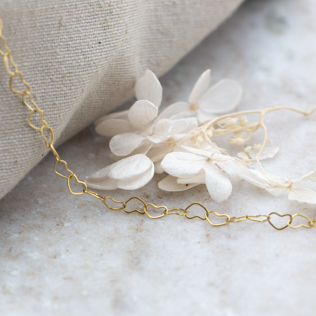 Goud harten armband