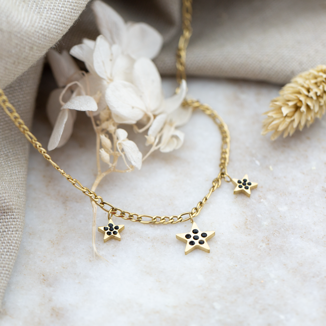Day & Eve  Goud schakelketting met zwarte sterren