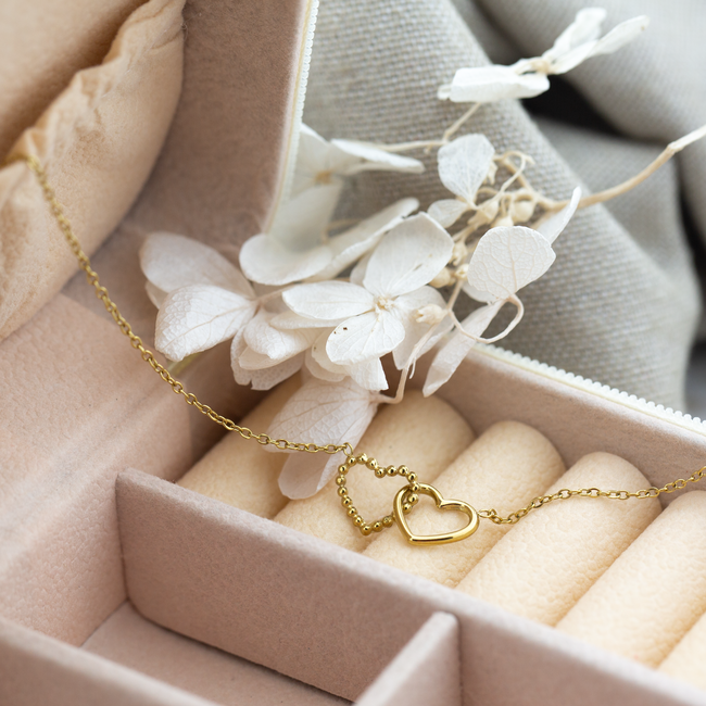 Goud dubbel hart armband