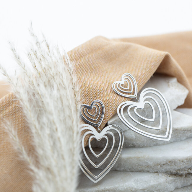 Day & Eve  Zilver retro hart oorbellen