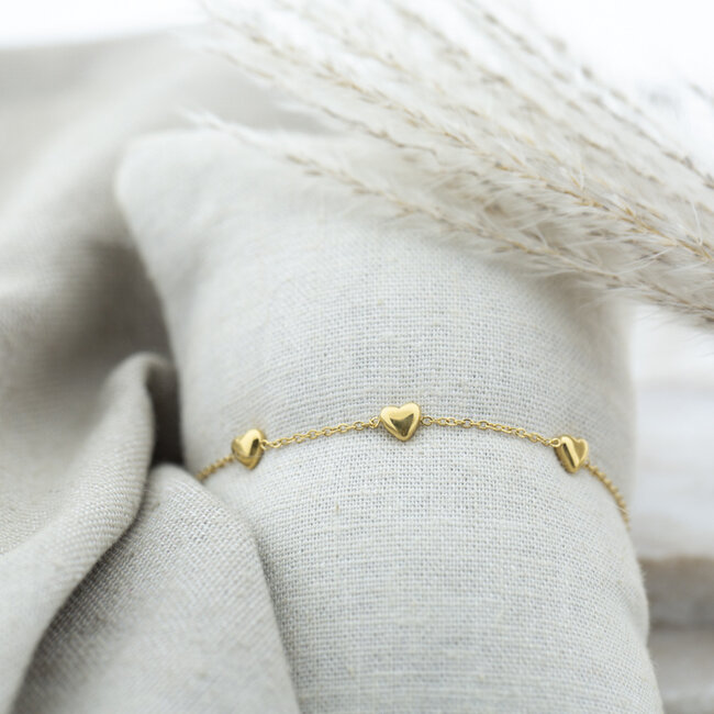 Day & Eve by Go Dutch Label Goud schakel, knoop of hart armband