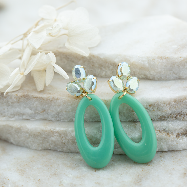 Biba blauwe resin bloem facet crystal oorbellen goud