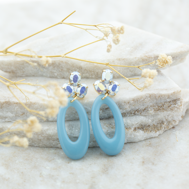 Biba blauwe resin bloem facet crystal oorbellen goud