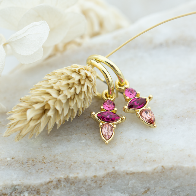 Goud oorringen met roze crystal druppels