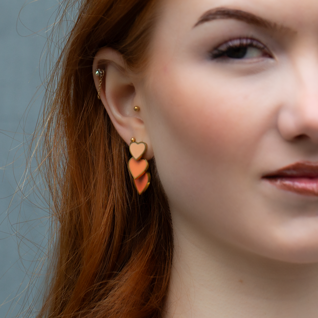 Day & Eve  Nude oranje harten oorbellen