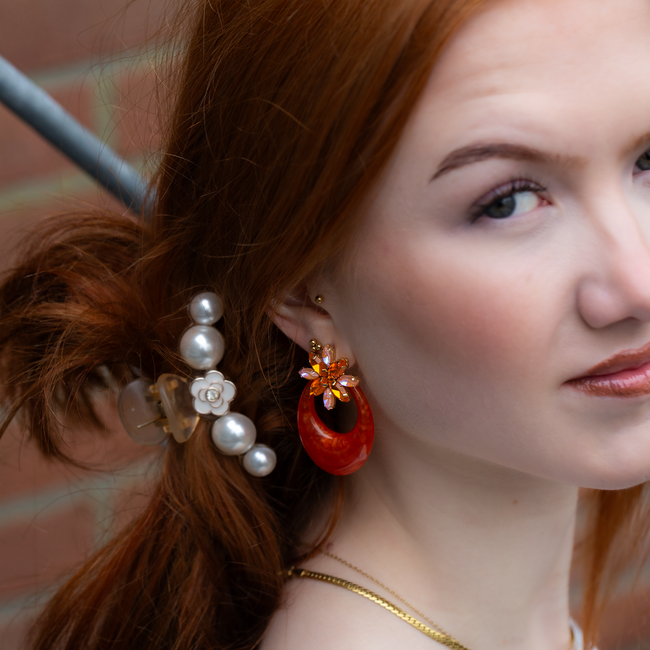 Biba Oranje bloem oorbellen