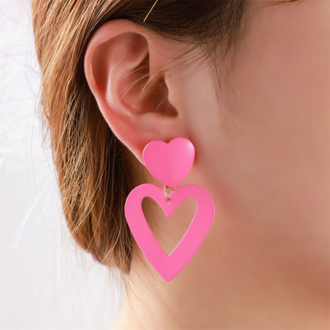Day & Eve  Dubbele  fuchsia grote hart oorbellen