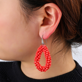 Day & Eve  Koraalrode druppel oorbellen