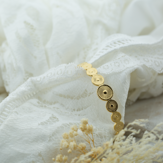 Goud bangle armband met ronde cirkels