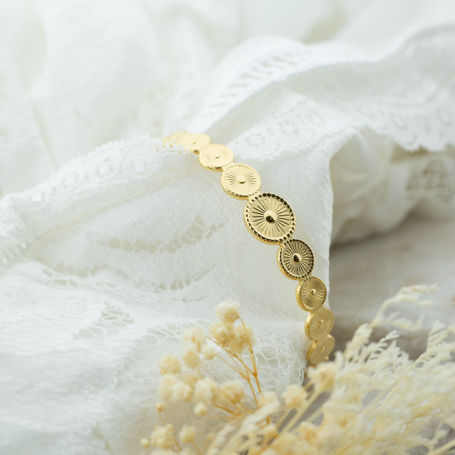 Goud bangle armband met ronde cirkels