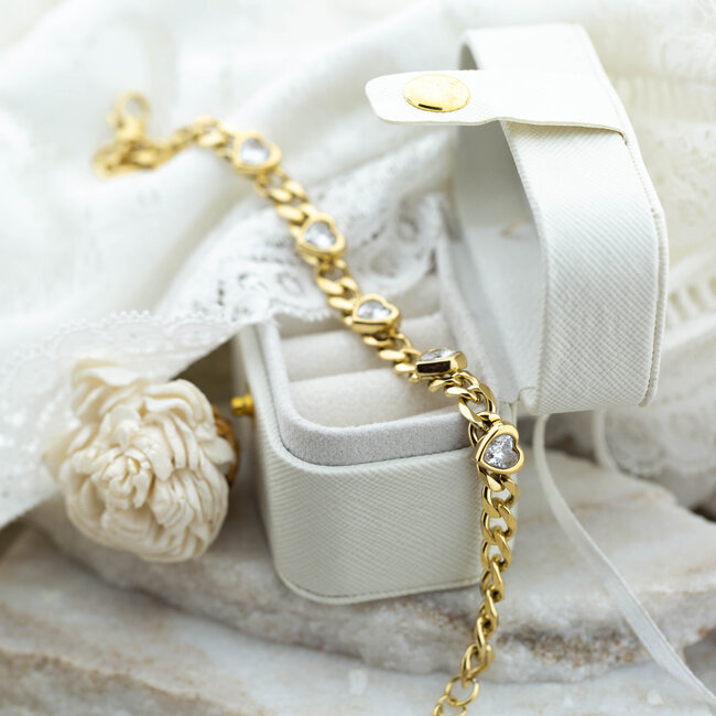 Beadle Goudkleurige schakelarmband met hartjes