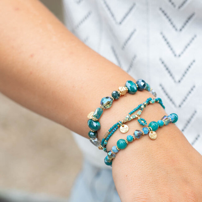 Donker turquoise blauwe kralen armband