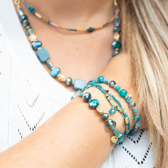 Donker turquoise blauwe kralen armband