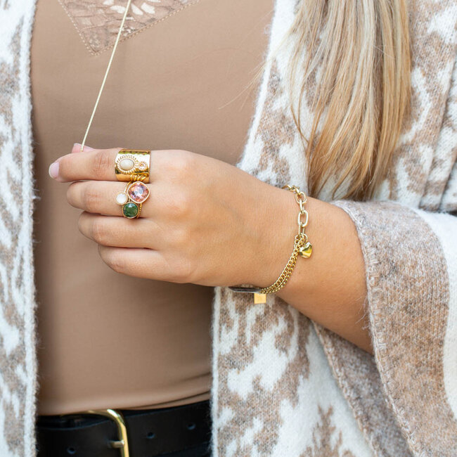 Gouden grovere schakelarmband met hart