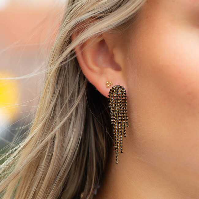 Gouden lange oorbel met zwarte glitter steentjes