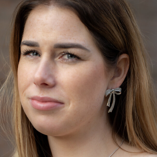 Beadle Zilver glitter strik bow oorbellen