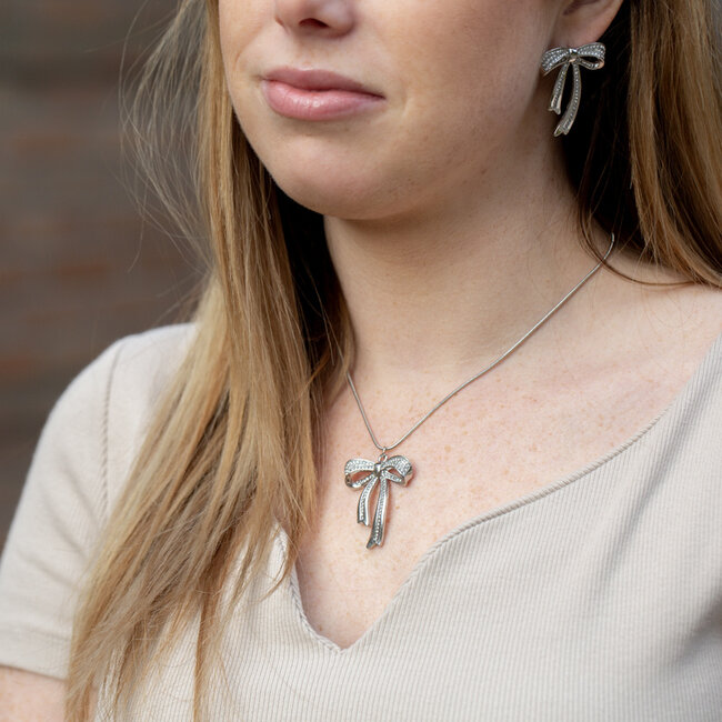 Beadle Zilver glitter strik bow oorbellen