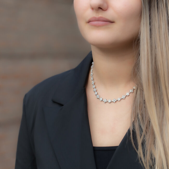 Beadle Chiq met een sparkle bloem en klaver glitter ketting