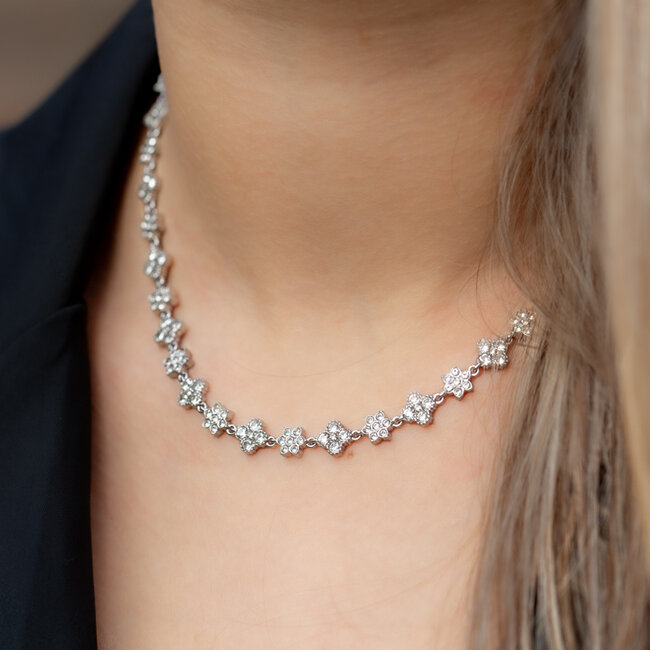 Beadle Chiq met een sparkle bloem en klaver glitter ketting