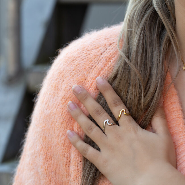Beadle Goud of zilver golf ring