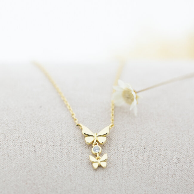 Goldplated ketting vlinders met zirconia steentje