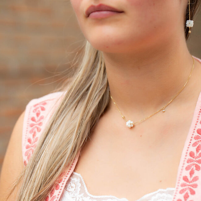 Stainless steel goud ketting of oorbellen met witte kralen bol
