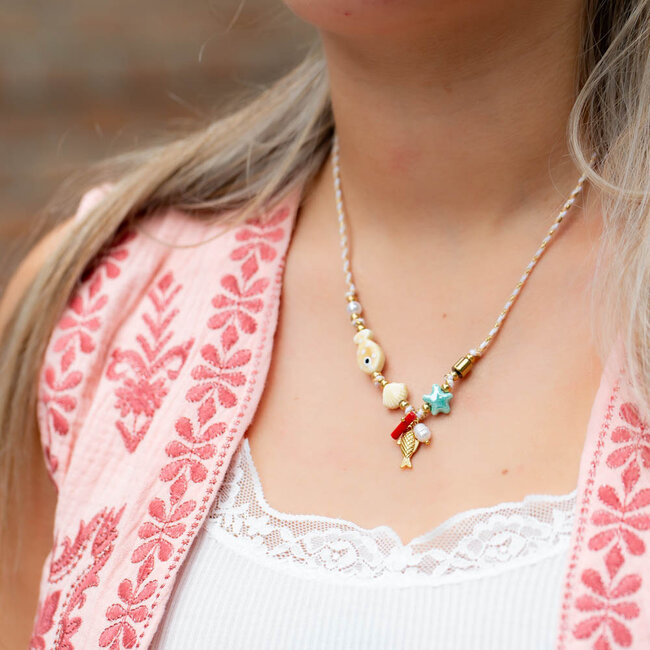 Ketting strand met keramiek vis, zeester en parel