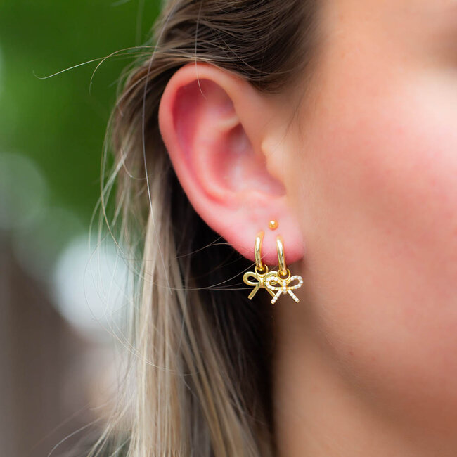 Goldplated zirconia strik bow oorbellen