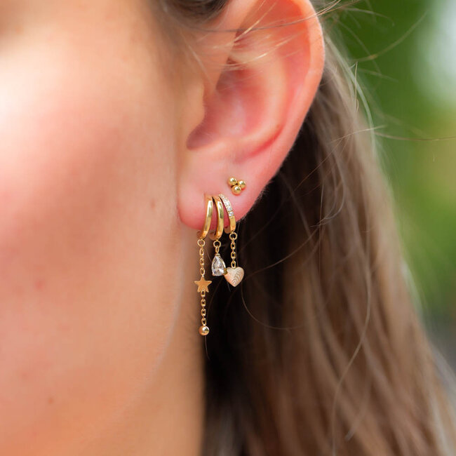 Goud oorbellen met ster, hart en druppel bedel