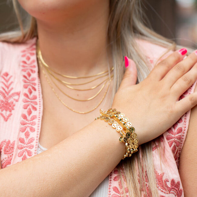 Vrolijke goud smiley armband