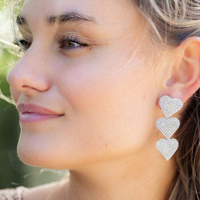 Biba Zilver party harten oorbellen met  glitter steentjes