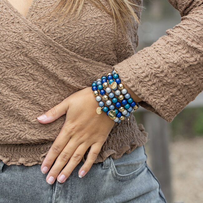 Blauwe magic beads armband