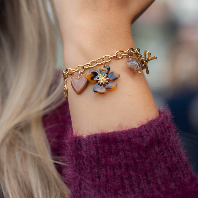 Goud schakelarmband met resin bedels tijger hart en bloem