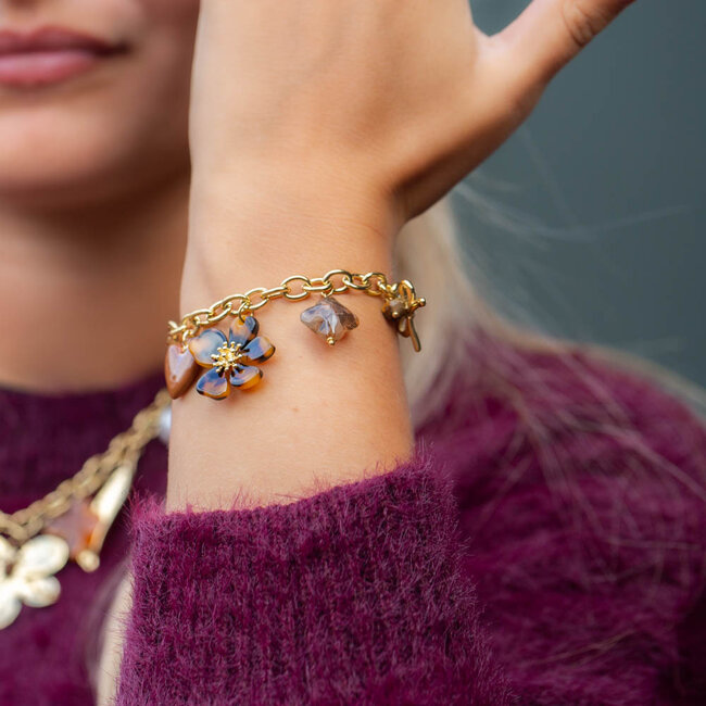 Goud schakelarmband met resin bedels tijger hart en bloem