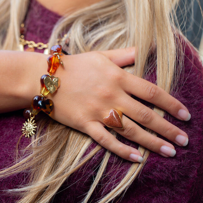 Beadle Verstelbare stainless steel ring met goudsteen hart.