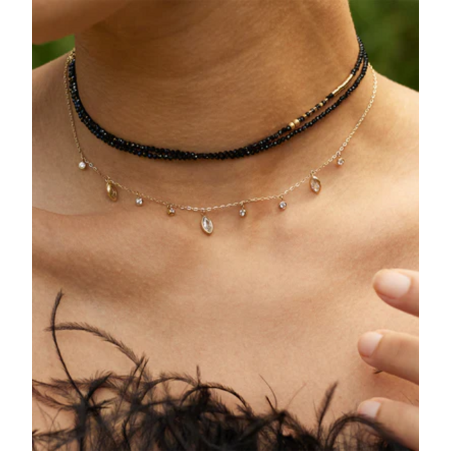 Goud ketting met glinsterende ovaal shiny bedels