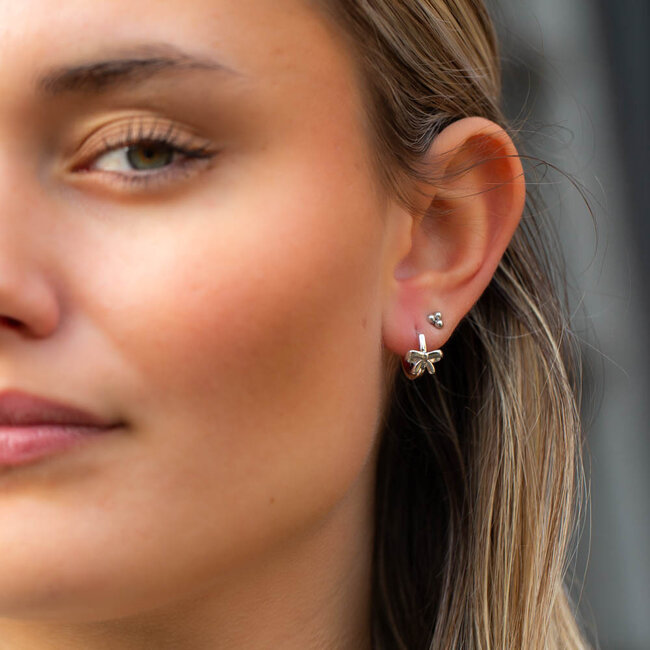 KARMA Echt zilveren oorbellen met strikje