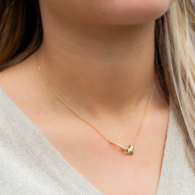 Ketting met hartje en subtiele glitters.
