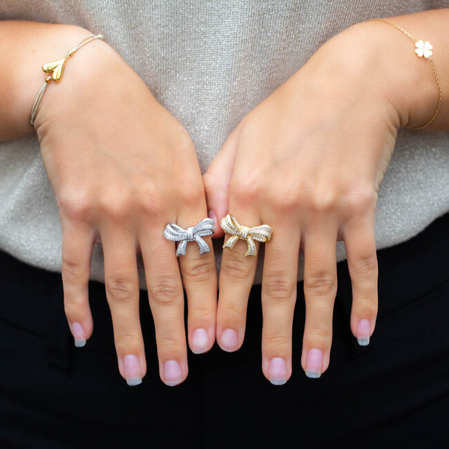 Gouden strik ring met glitters