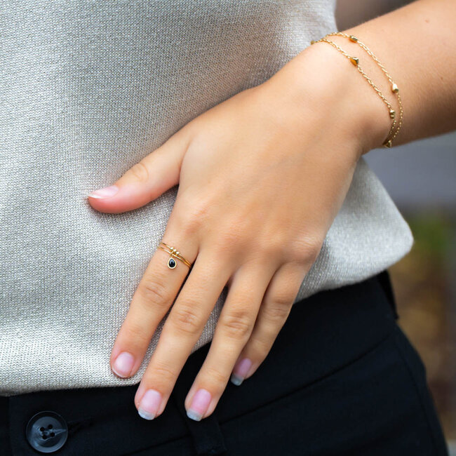 ZAG  Bijoux Gouden stainless steel ring met zwarte druppel