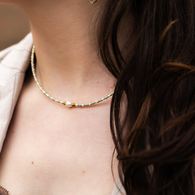 Biba Korte blauwe witte ketting met pareltje