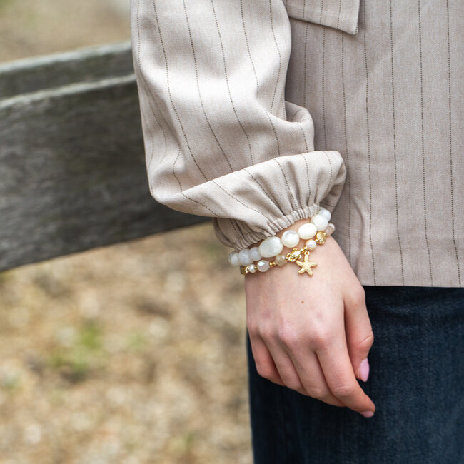 Biba Biba Armband in beige tinten of met zeester bedel