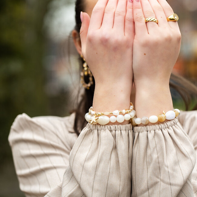 Biba Biba Armband in beige tinten of met zeester bedel