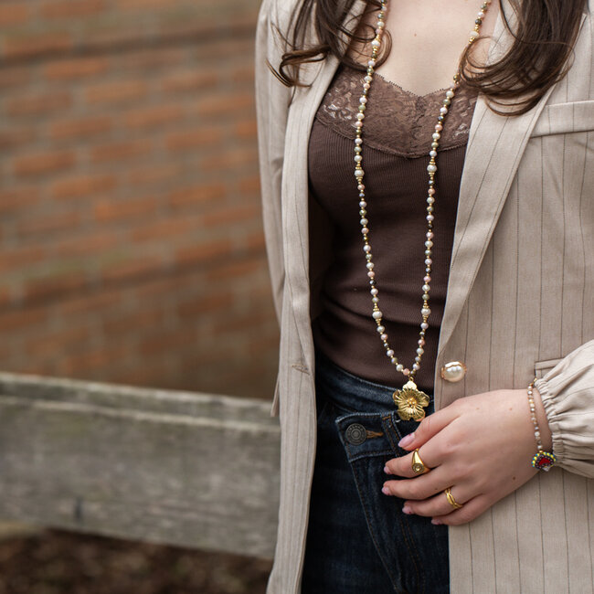 Lange ketting met grote bloemhanger
